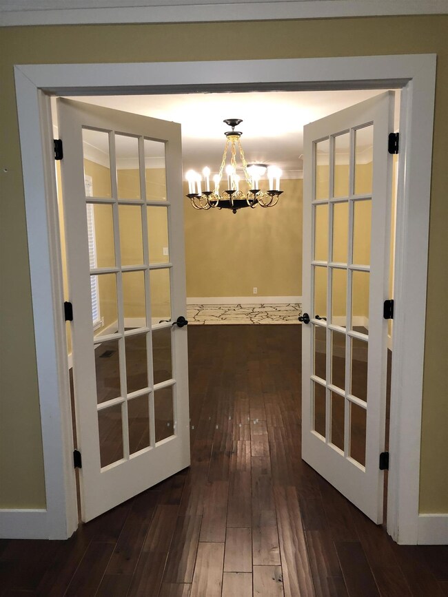 French doors from the office into the formal dining room