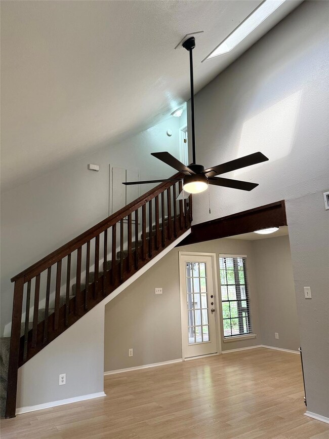 Unfurnished living room featuring light wood-styl