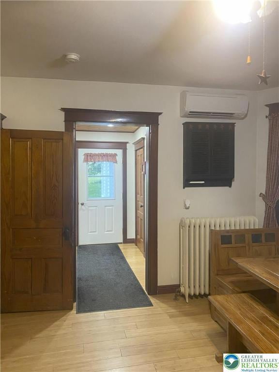 Unit 1 kitchen opens to laundry area and backyard