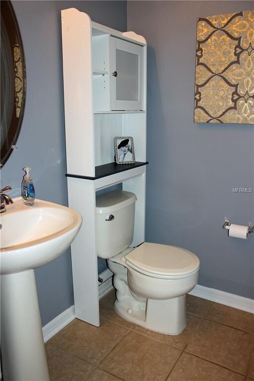 Half bath just inside front door for guests