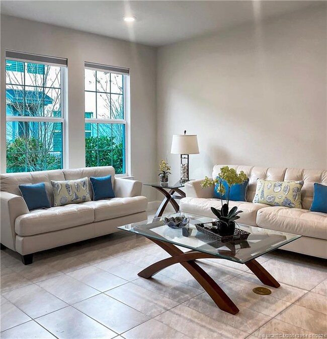 Open concept living, dining and kitchen.