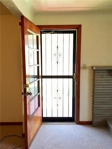 Lovely decorative door leading to the side porch.