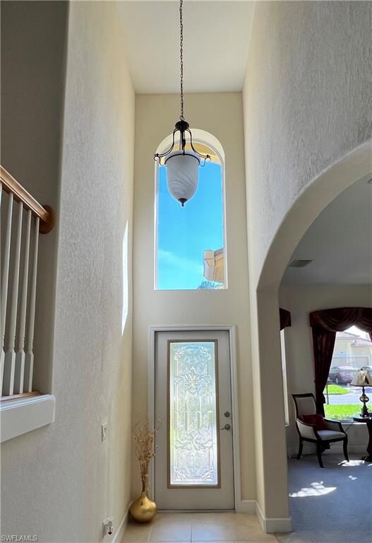Dramatic entry with cathedral ceiling