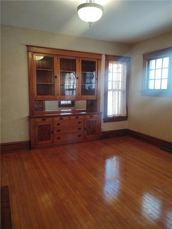 Bright Dining Room with beautiful built in hutch