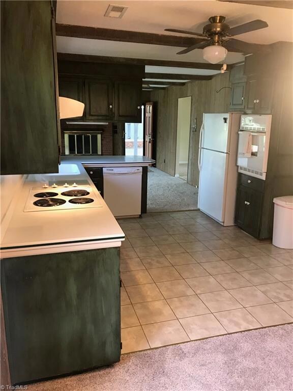 Looking back into the Kitchen/Den/Great room area from the Dining area.