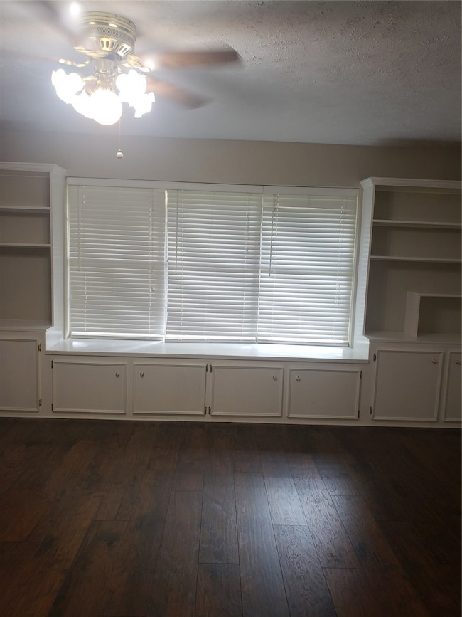 Very large family far wall has built-in bookcase