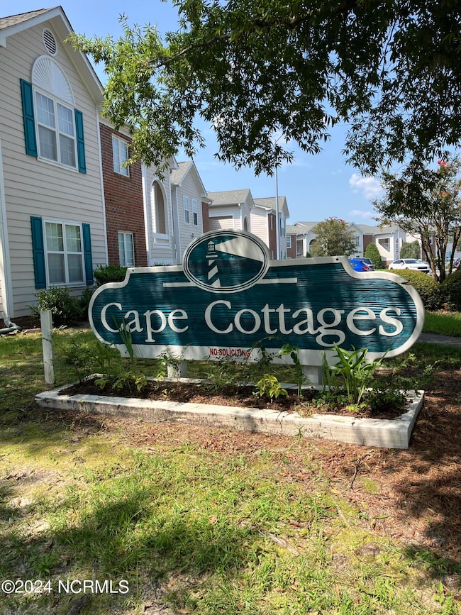 Melba Crt. Cape Cottages Sign