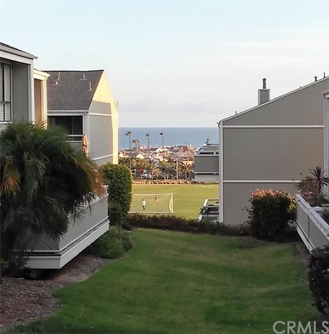 Living and dining room prtial ocean view.  