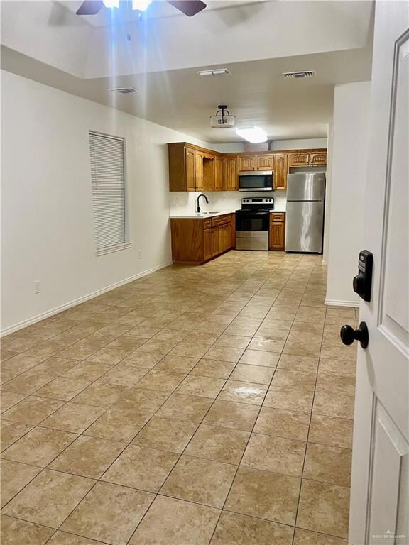 open concept living room with view of kitchen