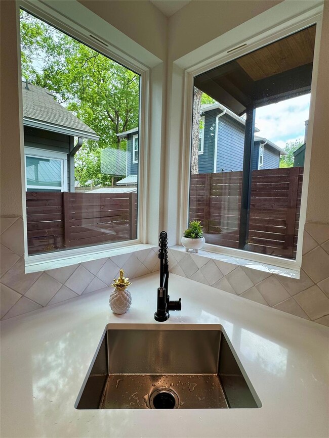 Room details with light countertops and a sink