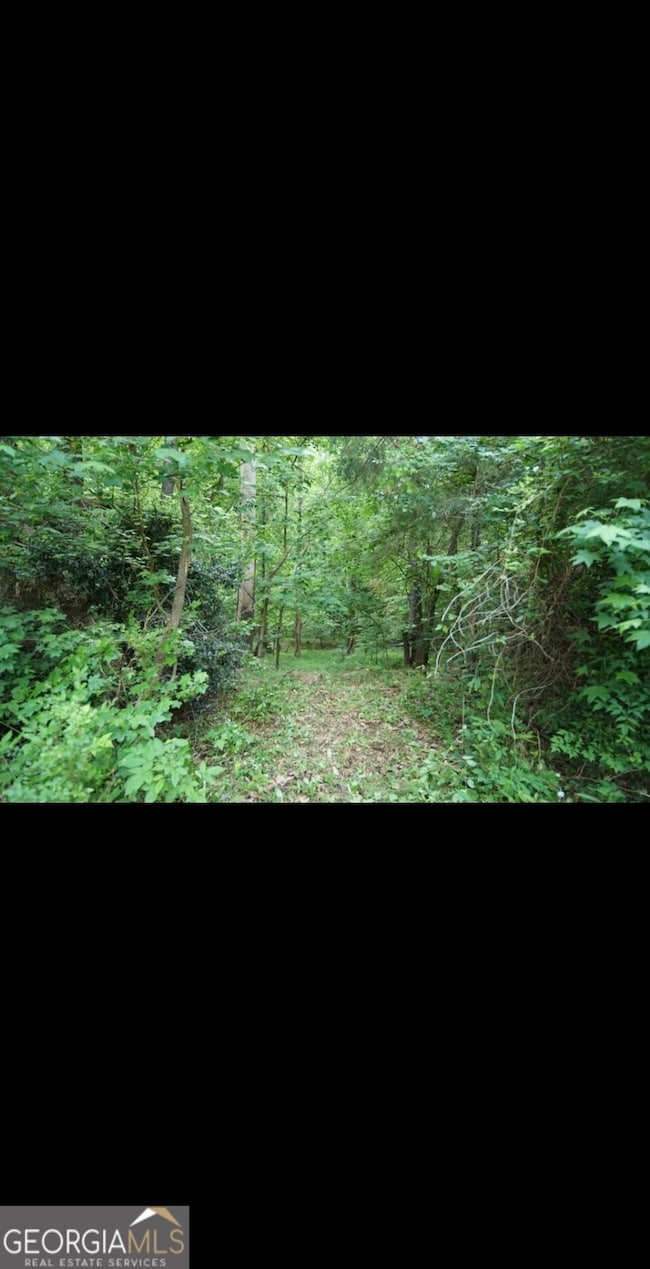 2877 Heather Row Ridge SW, Lilburn, GA 30047 - photo 5