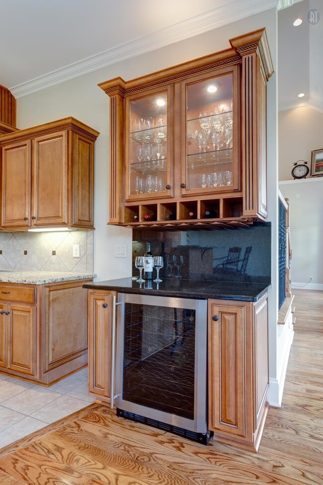 Custom Wine Bar complete with refrigerator. 