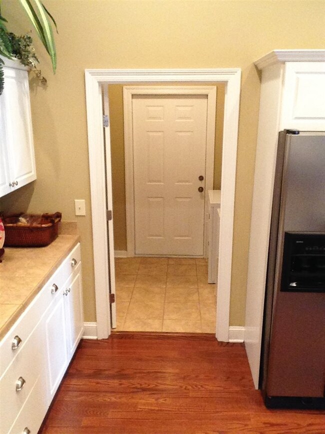 Laundry room entrance off kitchen.