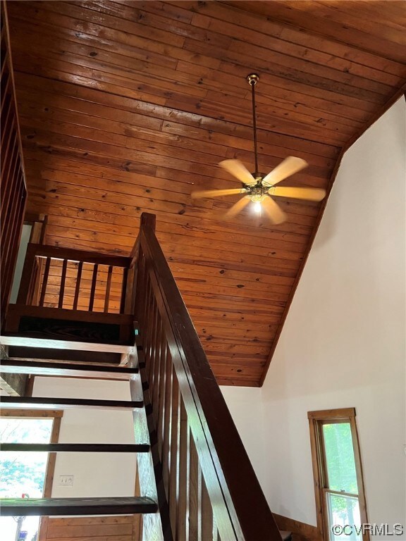 Stairway featuring plenty of natural light