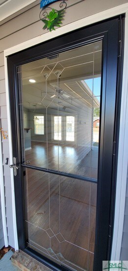 Front Storm door lets in natural light and include