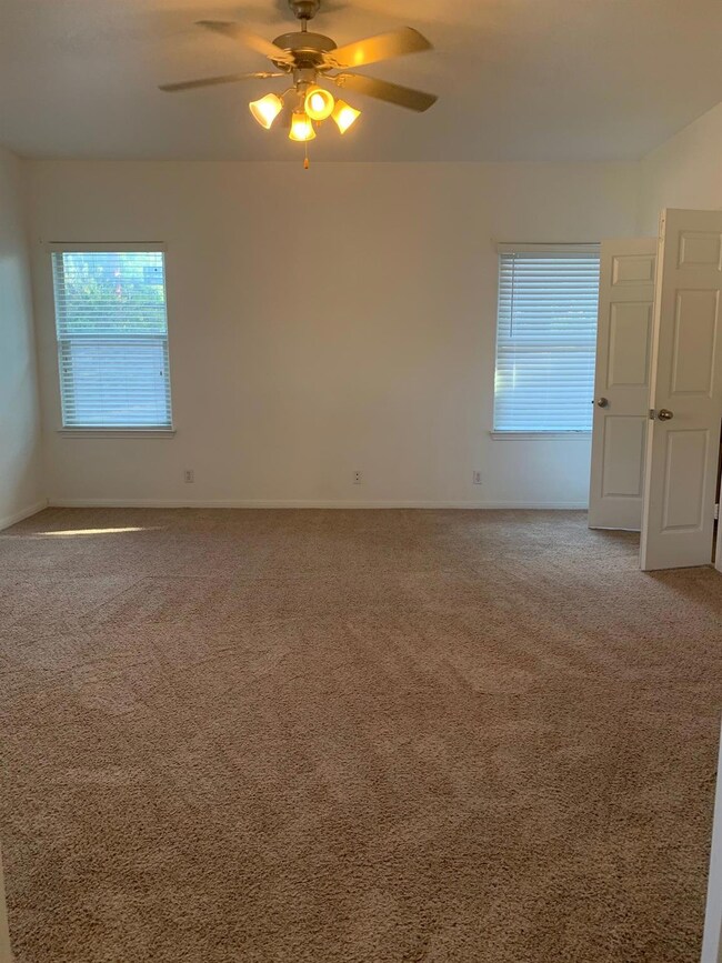 Empty room featuring plenty of natural light, lig