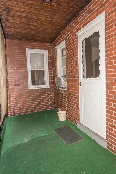 Peaceful side porch with access from the yard or t