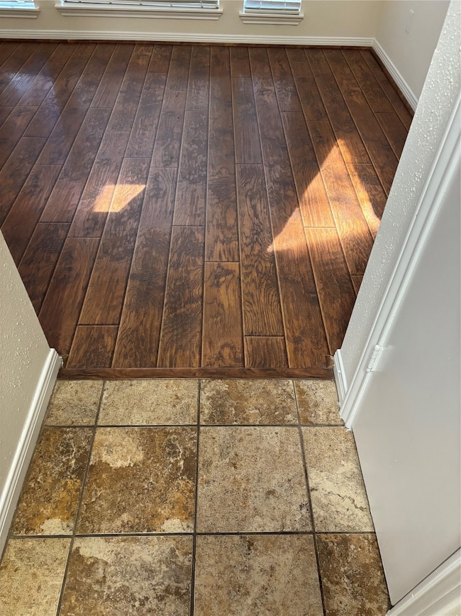 This is a view of the flooring in the kitchen and living rooms.