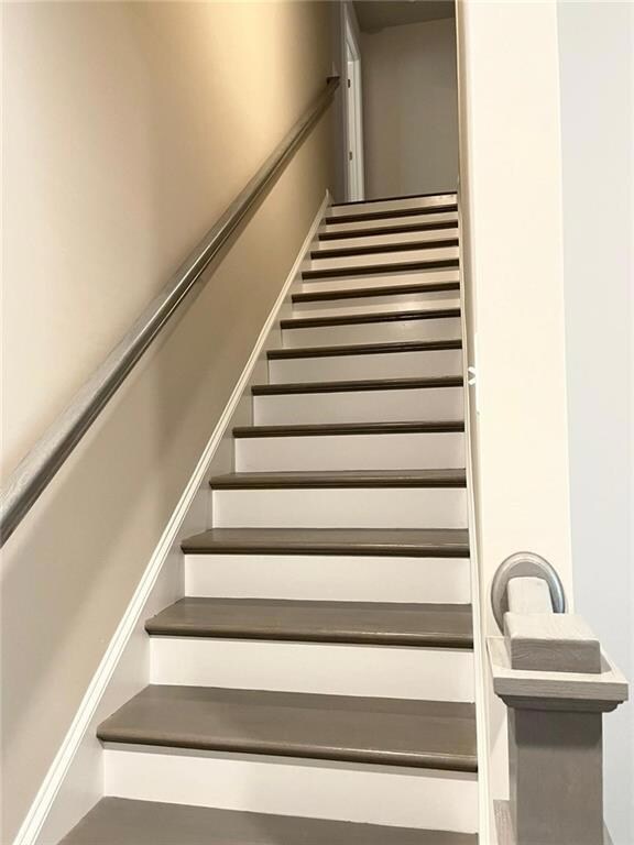 View of stairway that leads to the master bedroom (retreat) and secondary bedrooms.