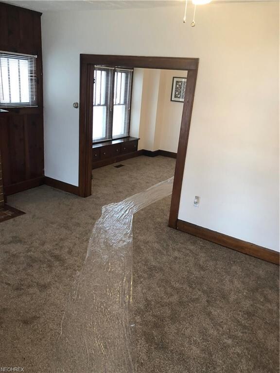 New carpet from living room into dining room
