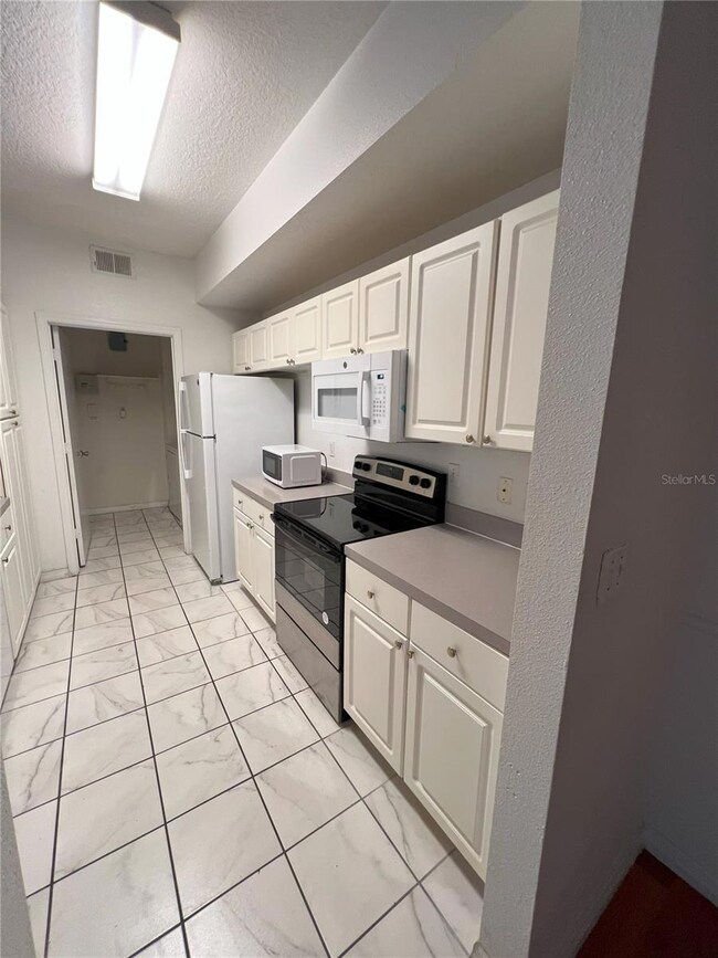 5542 Metrowest Blvd unit 206, Orlando, FL 32811 - photo 7