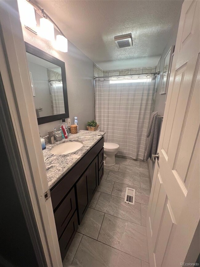 14470 E 13th Ave unit A19, Aurora, CO 80011 - photo 2