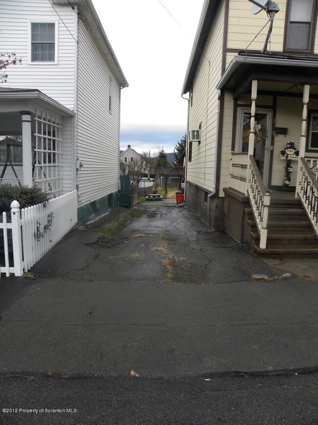 Two cars fit in driveway