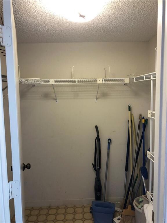 Downstairs Master Bedroom Walk-In Closet