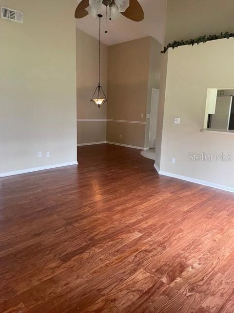 Hardwood Floors throughout High Ceilings and Open Floor Plan