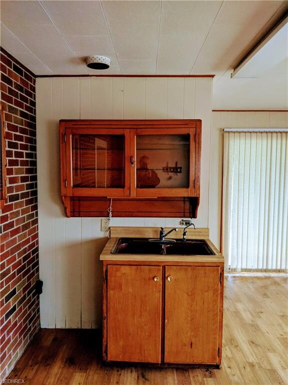 Sink in great room. Electric stove hook up and roo