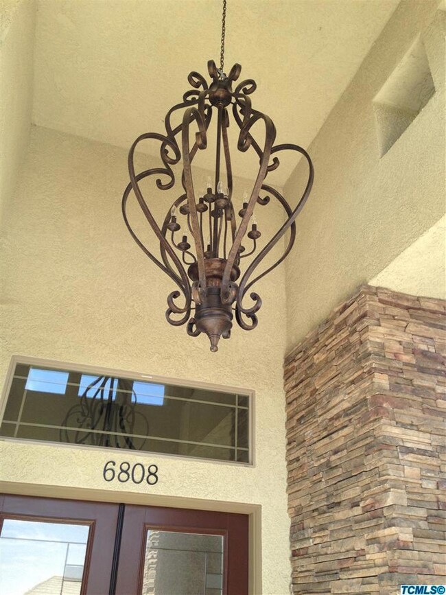 Gorgeous Fixture has a chandelier lift f