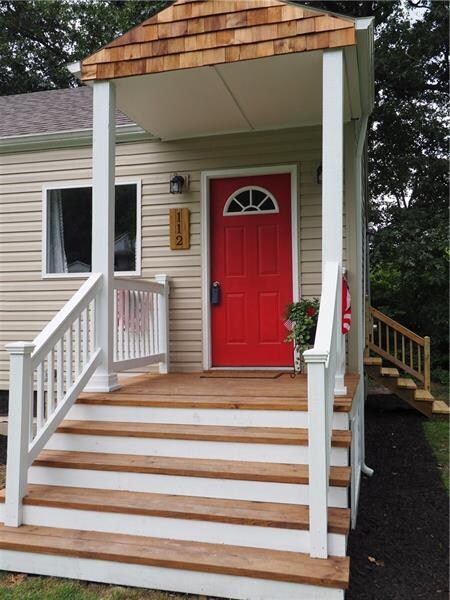 Beautiful new front porch and door will welcome you home each evening.