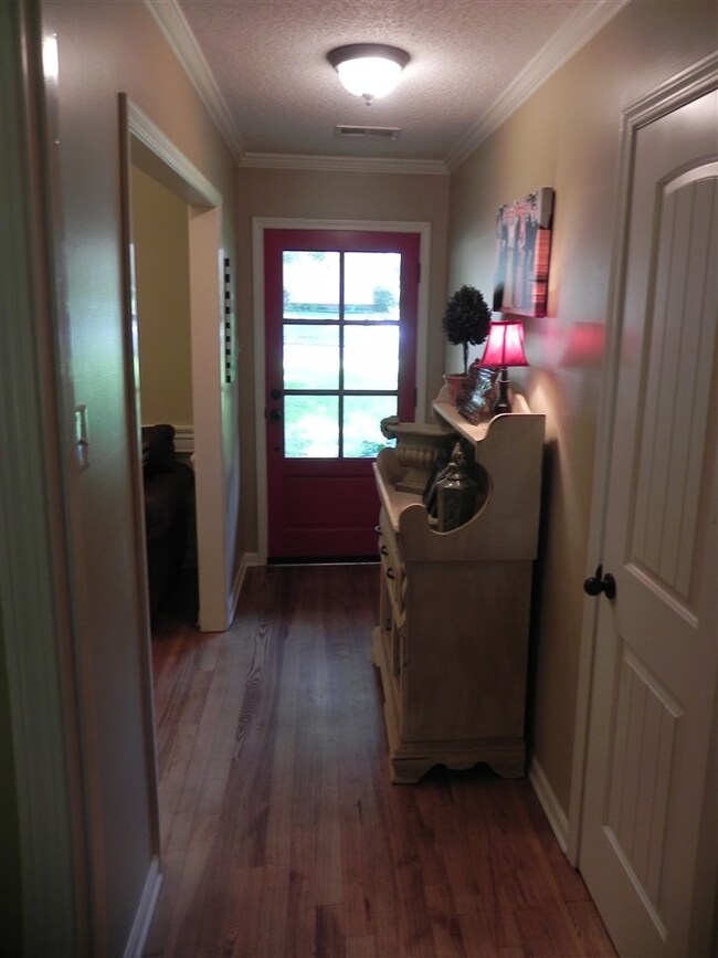 Hardwoods, updated lighting, plus a coat closet!
