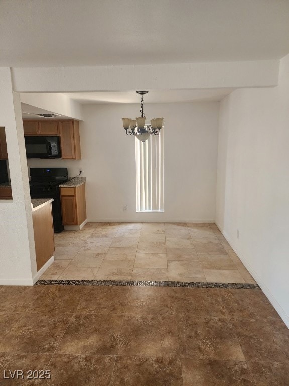 Unfurnished dining area with a chandelier and base