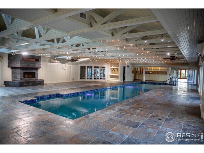 With a large 54x12 indoor heated pool!  Imagine all the pool parties you can have in this space!