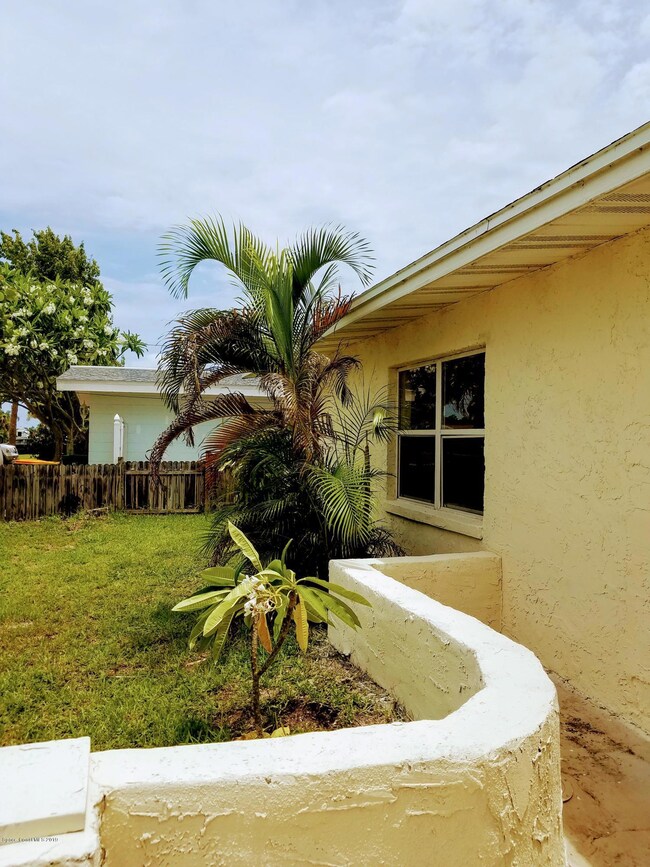 Near Front door, outdoor faucet