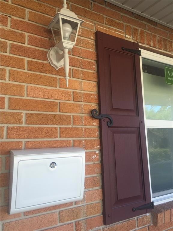 New mailbox, exterior light, shutters and windows.