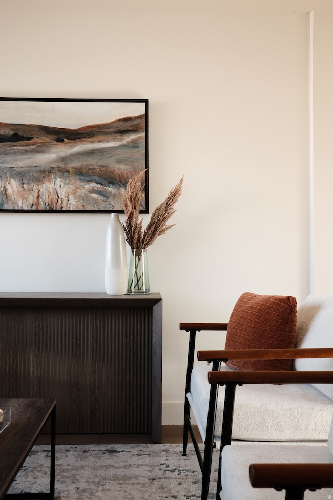 Detailed view of wood finished floors and baseboards