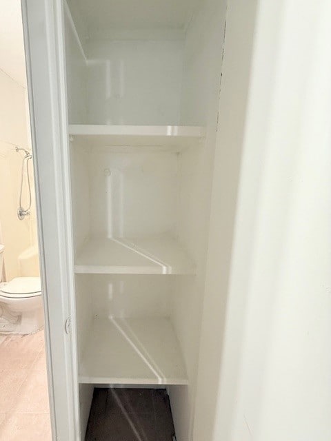 Built in shelving in primary closet.