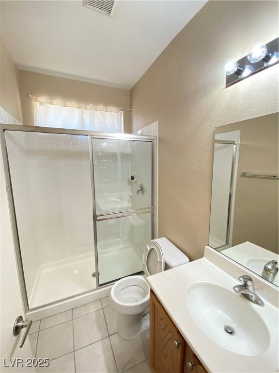 Bathroom featuring tile flooring, single sink vani