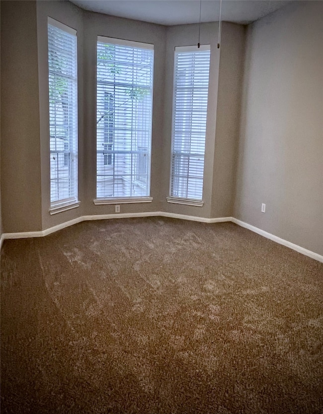 Large bedroom (11'x15') with a bay window.