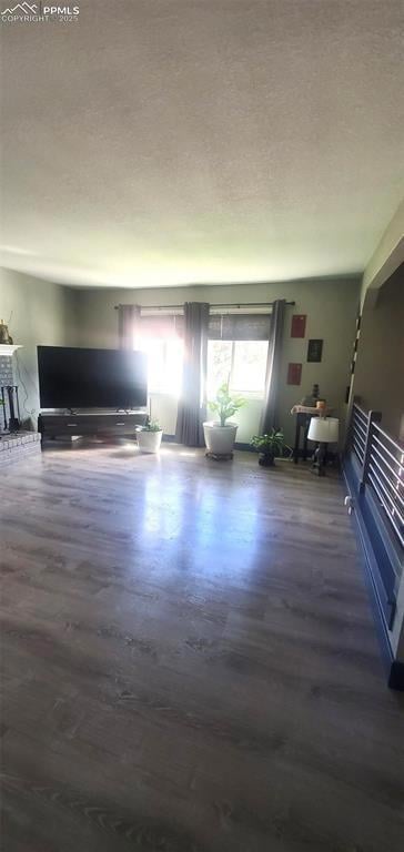 Living area with laminate finished floors.