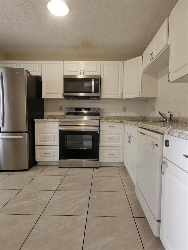 Kitchen updated with newer stainless steel appliances