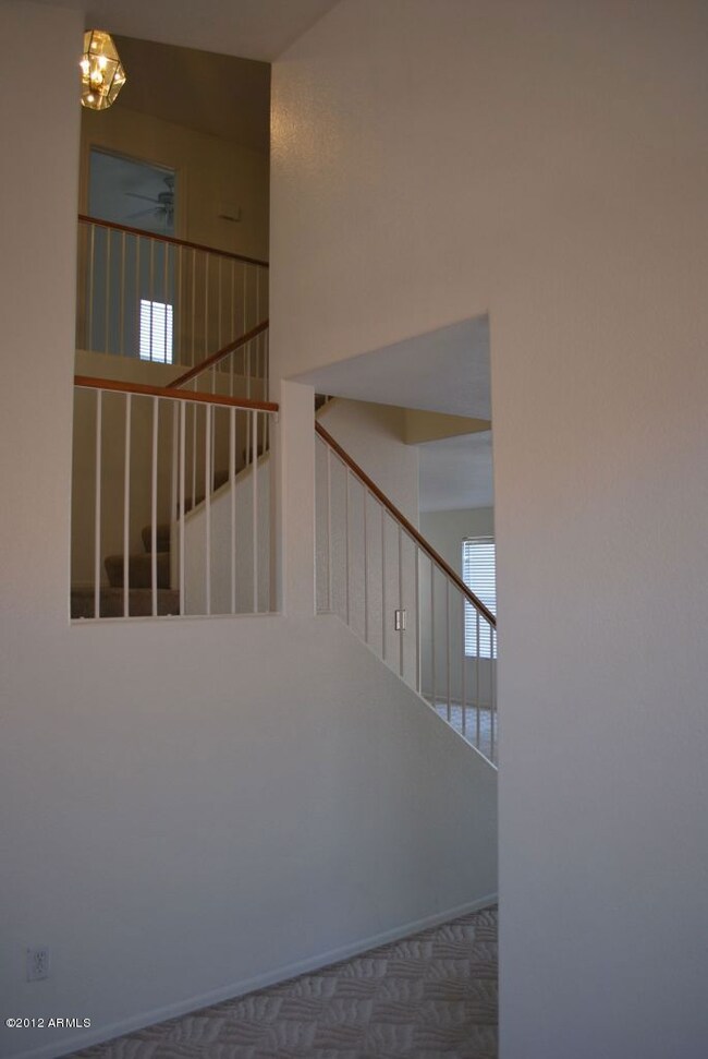 Open two story stairs to upper level.
