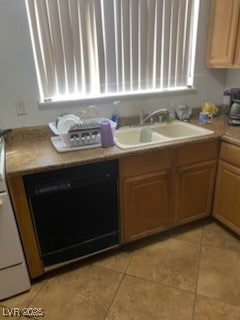 Kitchen with black dishwasher, a sink, light tile