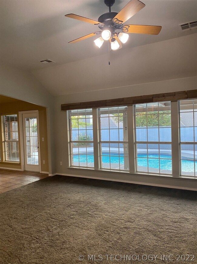 Large living, dining, outside door to covered pati