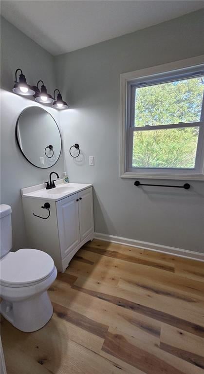 Bathroom featuring light wood-style floors and vanity