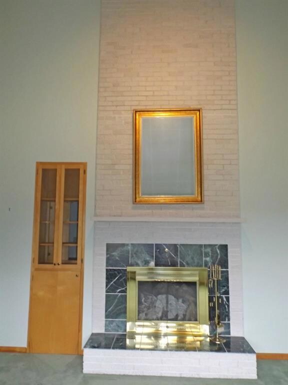 Living room: marble wood-burning...