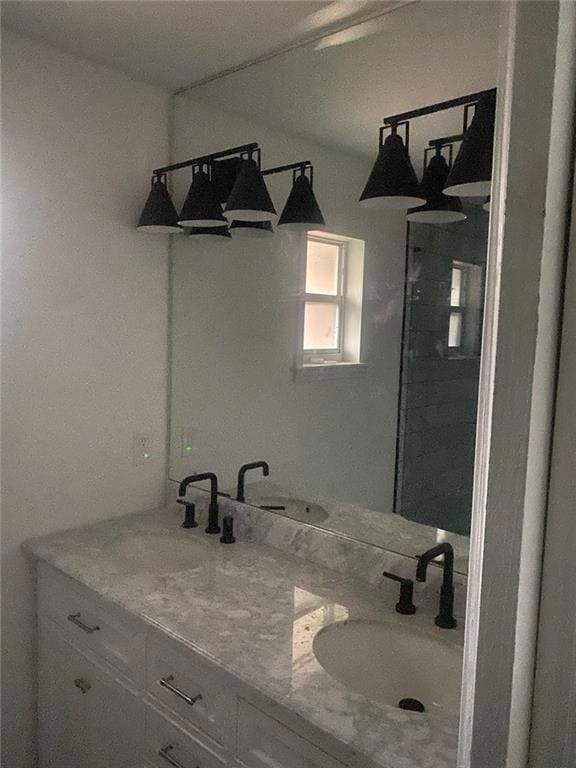 Full bath featuring double vanity
