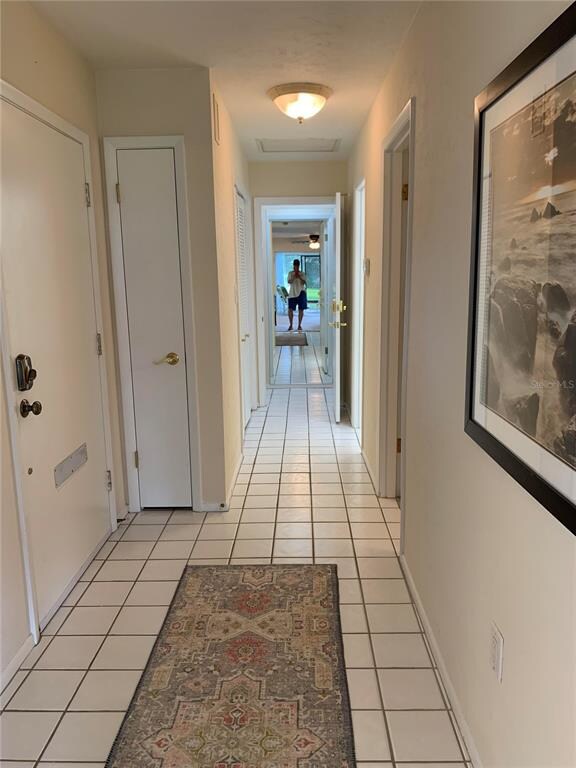 Main hall standing where kitchen and family room m